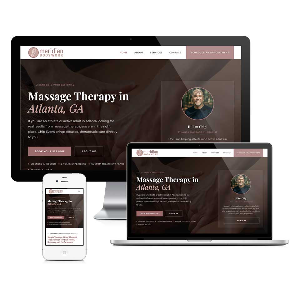 A massage therapist working with a client in a calm treatment room